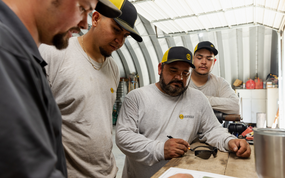 Our team members plan a backyard renovation in Olathe