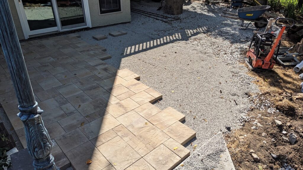 An unfinished hardscaping project using patio pavers in Leawood.
